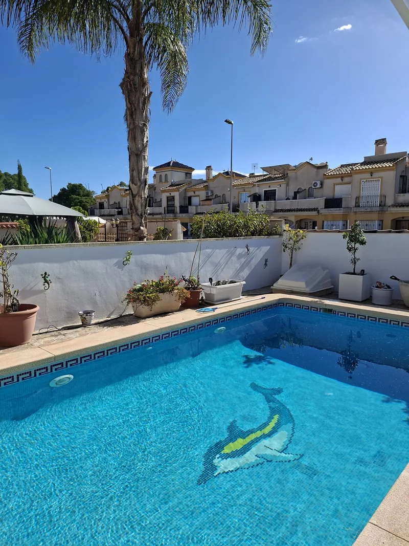 Freshly painted pool and garden walls